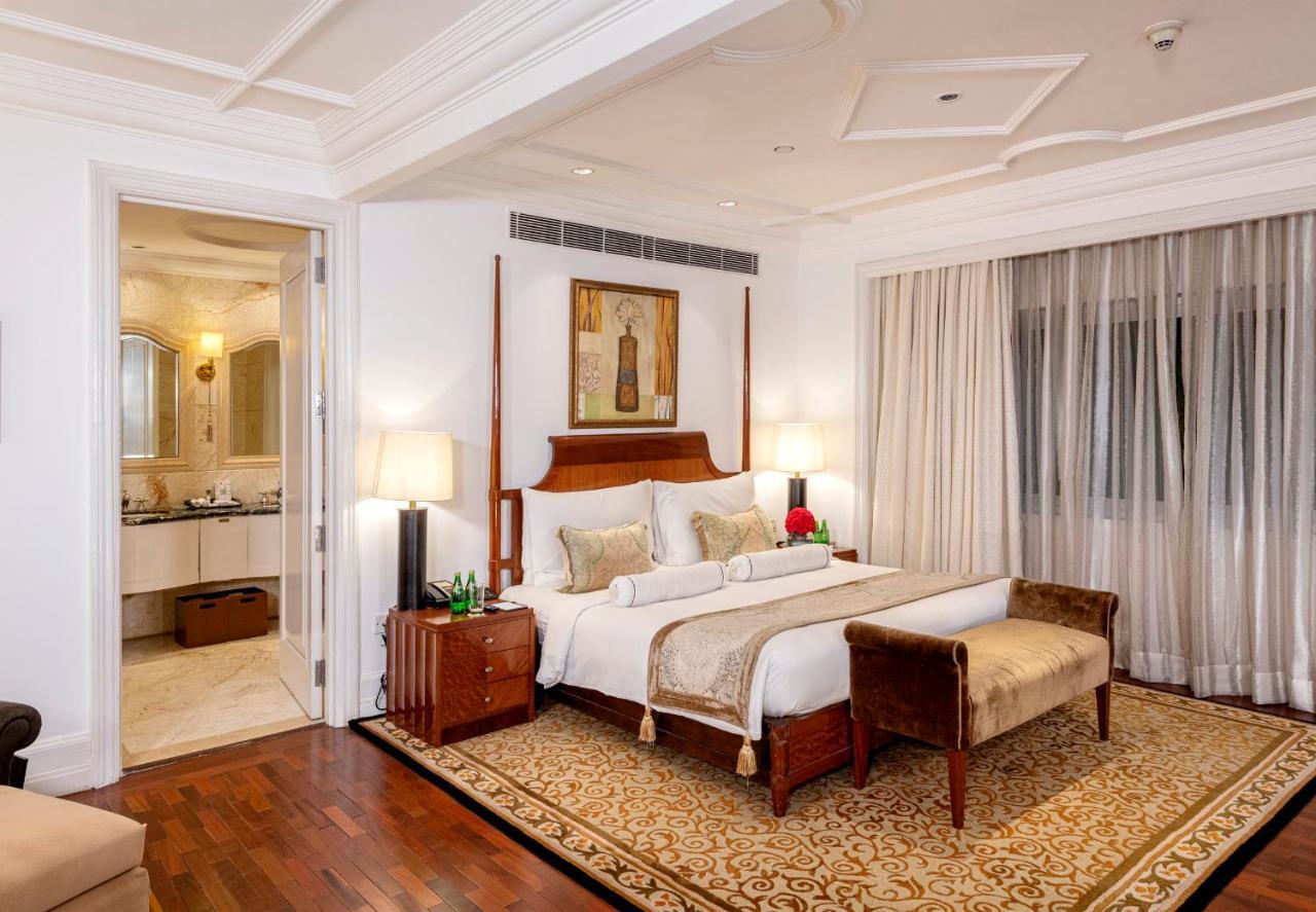 The Claridges New Delhi Hotel Ngoại thất bức ảnh A bedroom at the Taj Mahal Palace